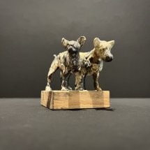 Jeff-Geib-Two-Dogs-Sharing-a-Stand-clay-sculpture-wood-3-x-4.5-x-2.5-inches